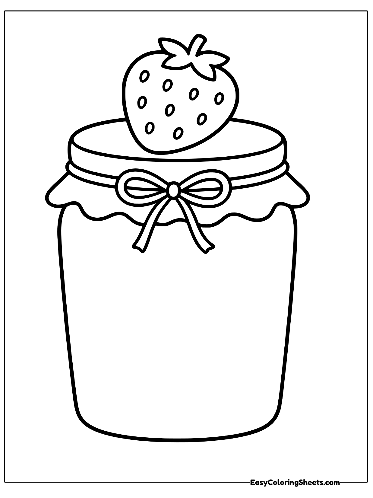 A tall jar of strawberry jam has a ruffled cloth lid tied with a bow and a fresh strawberry sitting right on top.