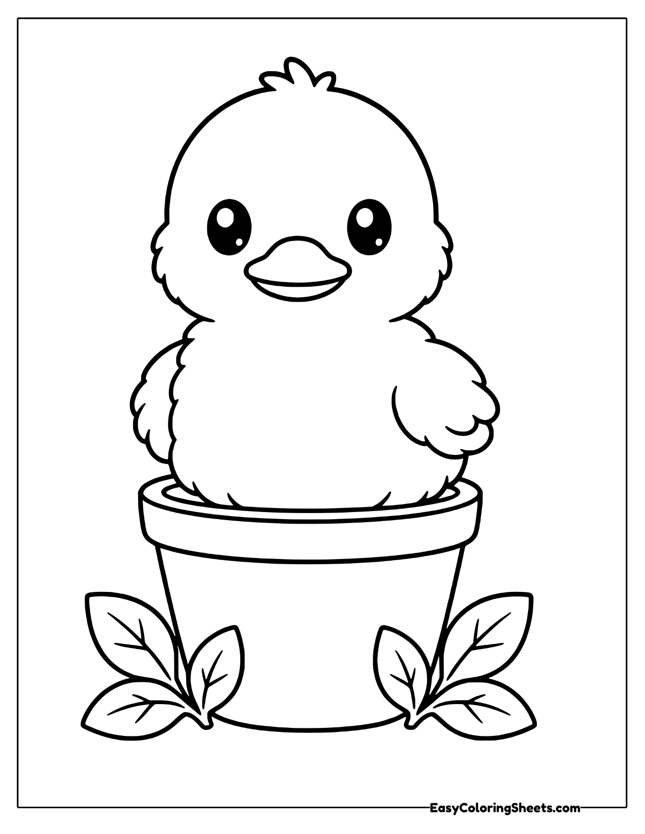Duckling sitting in a flower pot