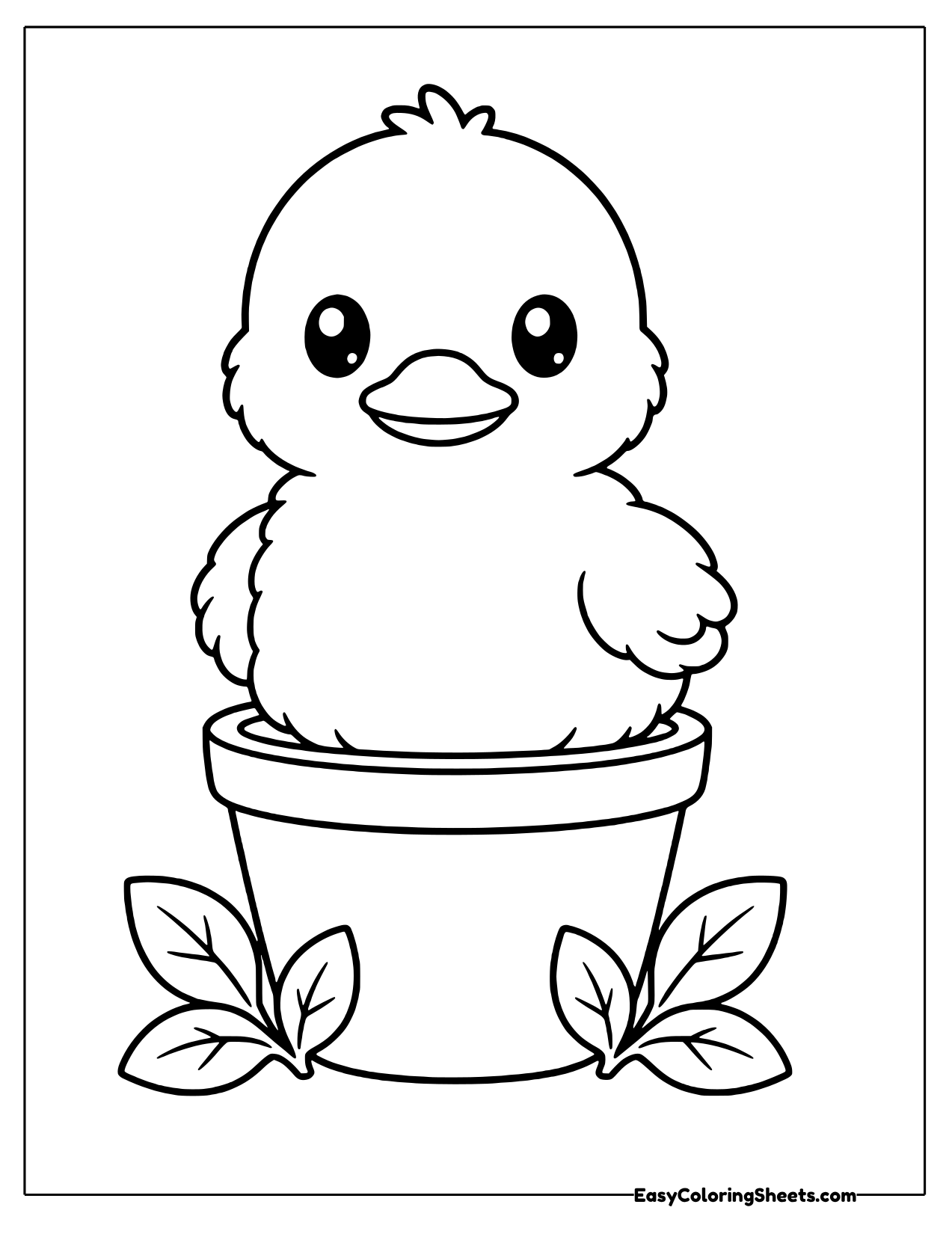 Duckling sitting in a flower pot