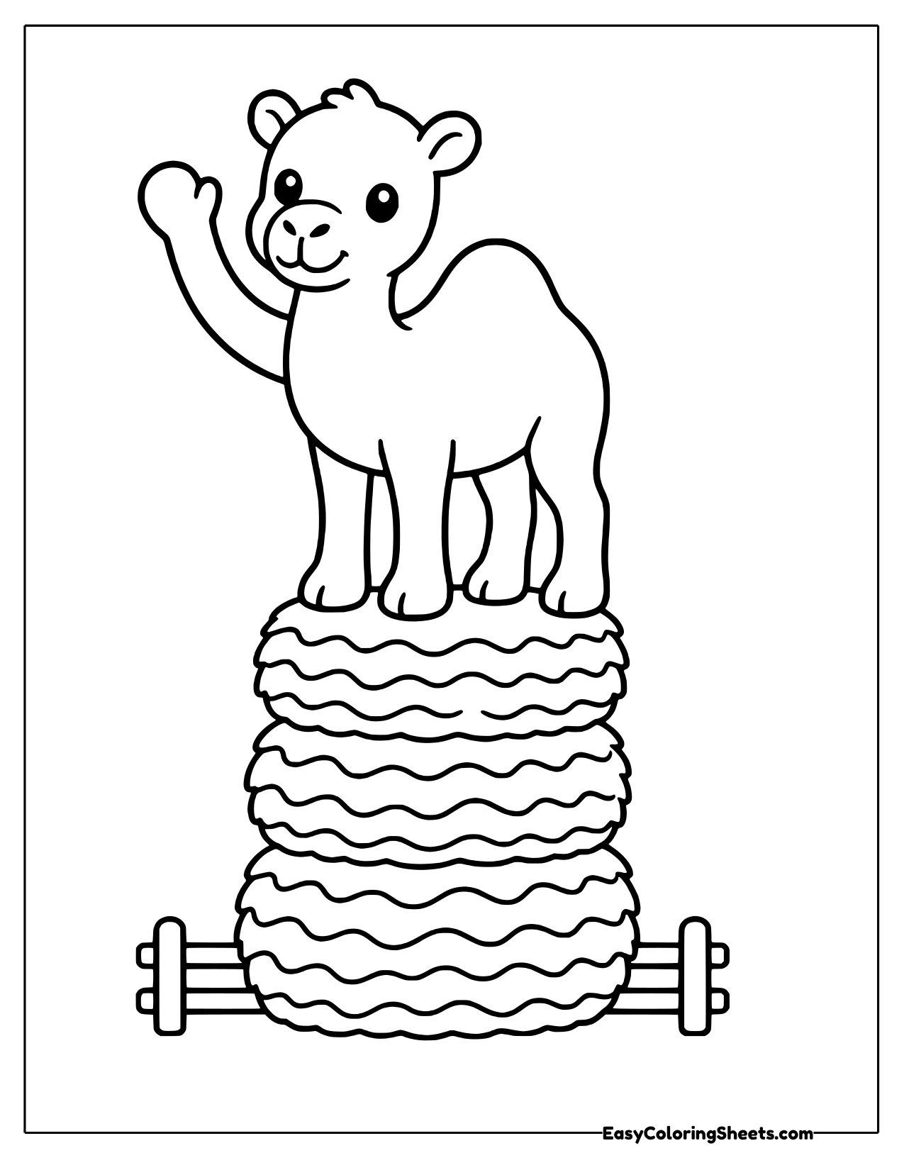Camel standing on a stack of hay bales