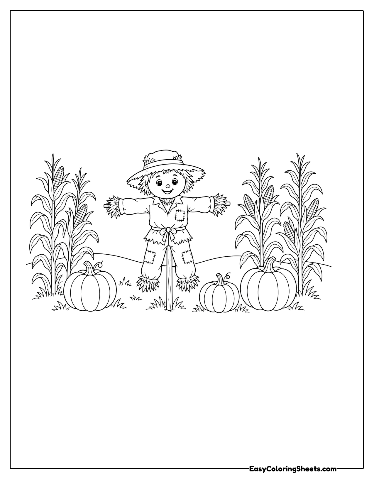 Scarecrow on a post between rows of corn with pumpkins on the ground