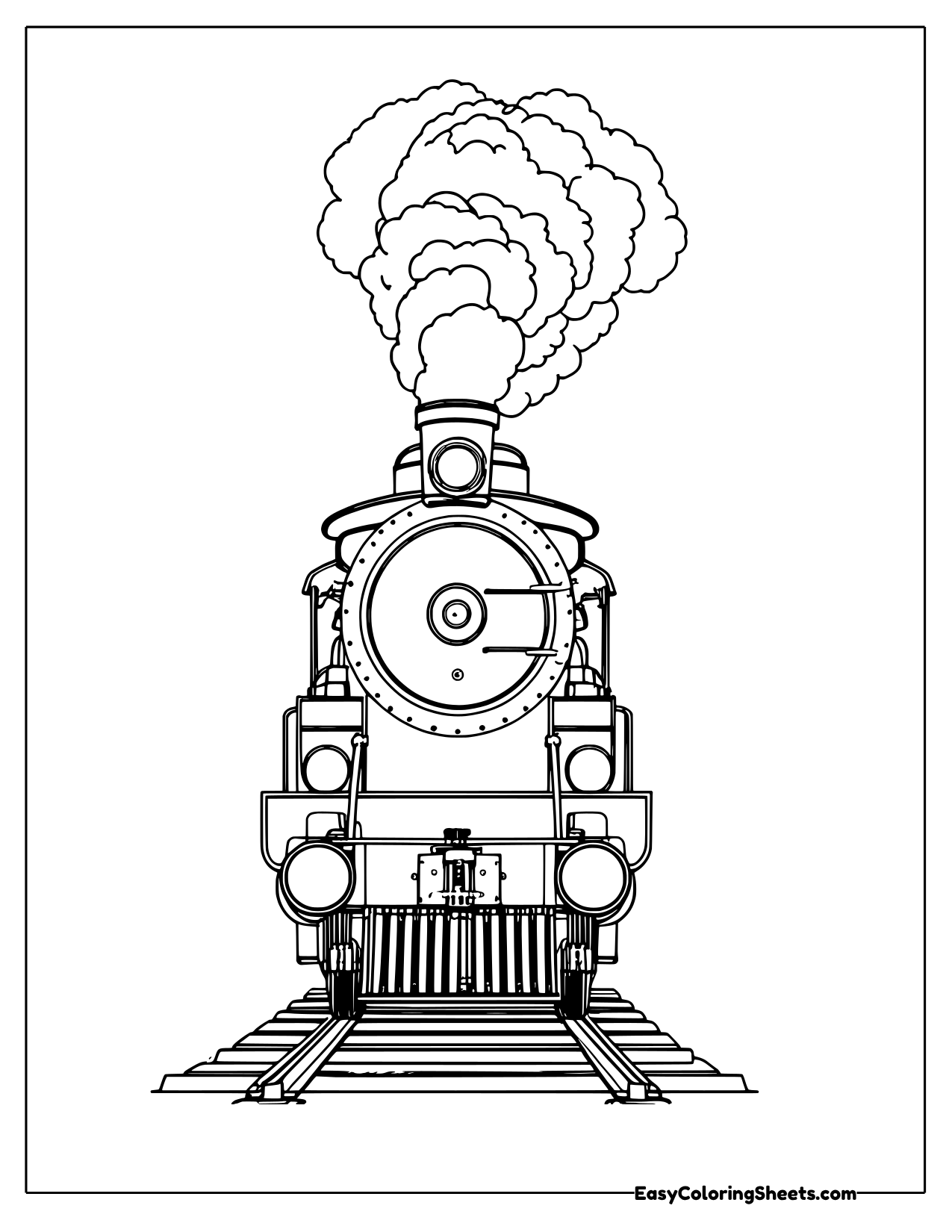 Head on view of a streamlined vintage steam locomotive with rails in front