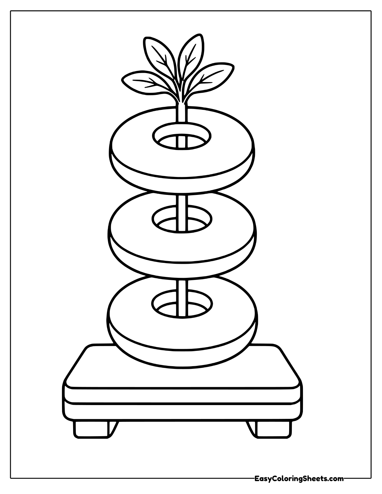Bagels on a skewer with a leaf on top