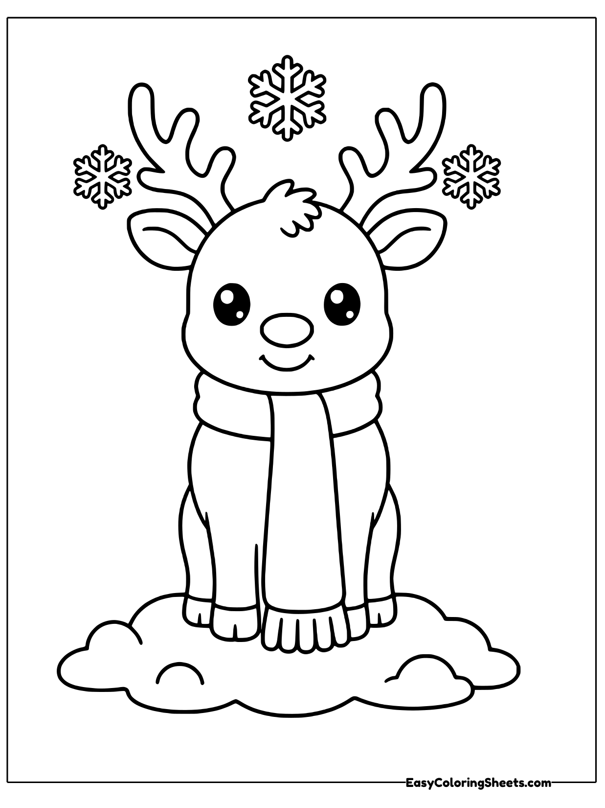 A reindeer sits on a snowy patch with a long striped scarf wrapped around its neck and hanging down its chest.
