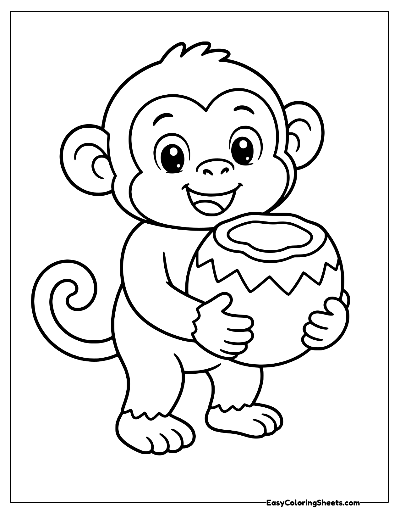 Monkey hugging a coconut