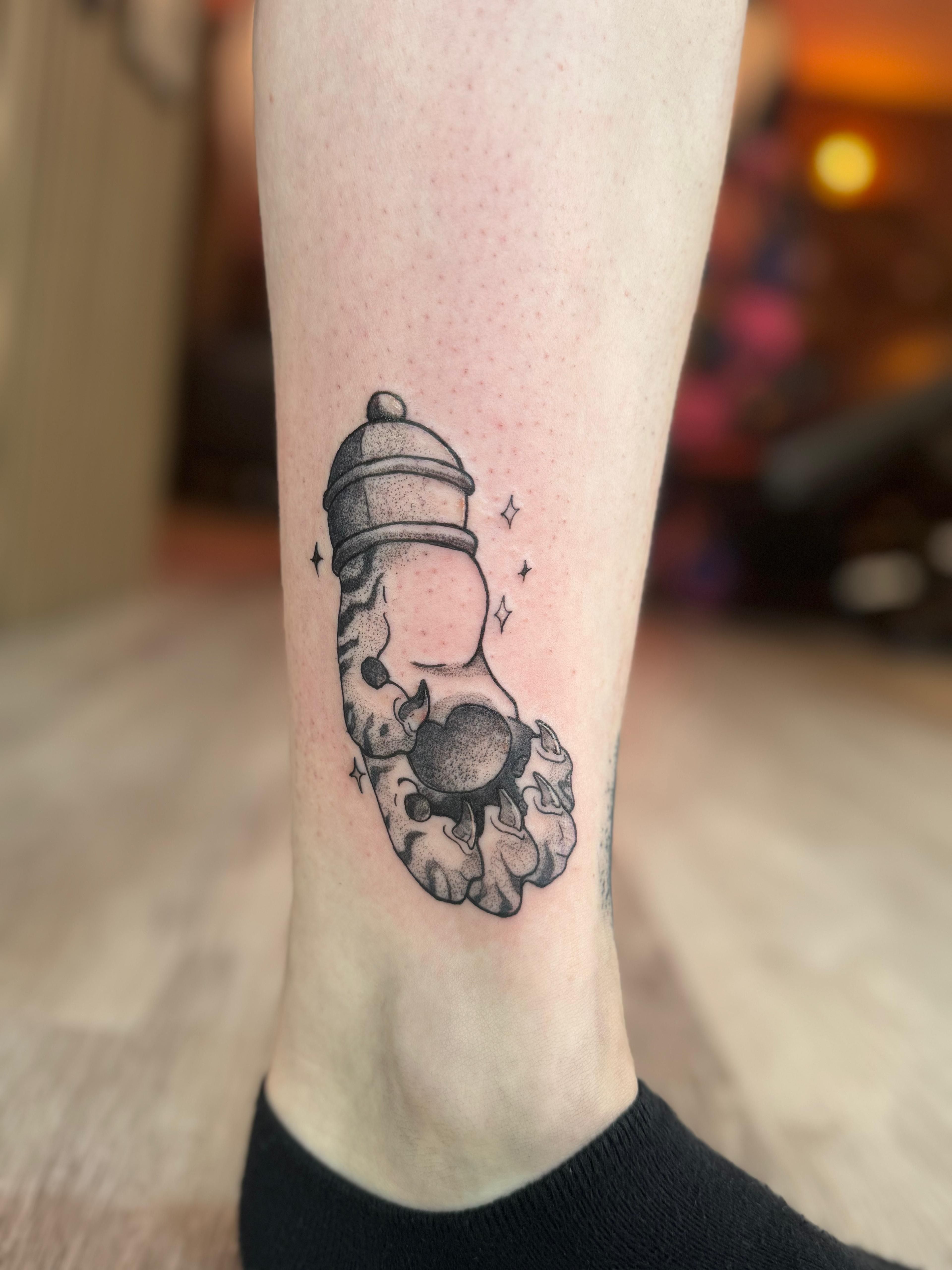 Tiger paw tattoo