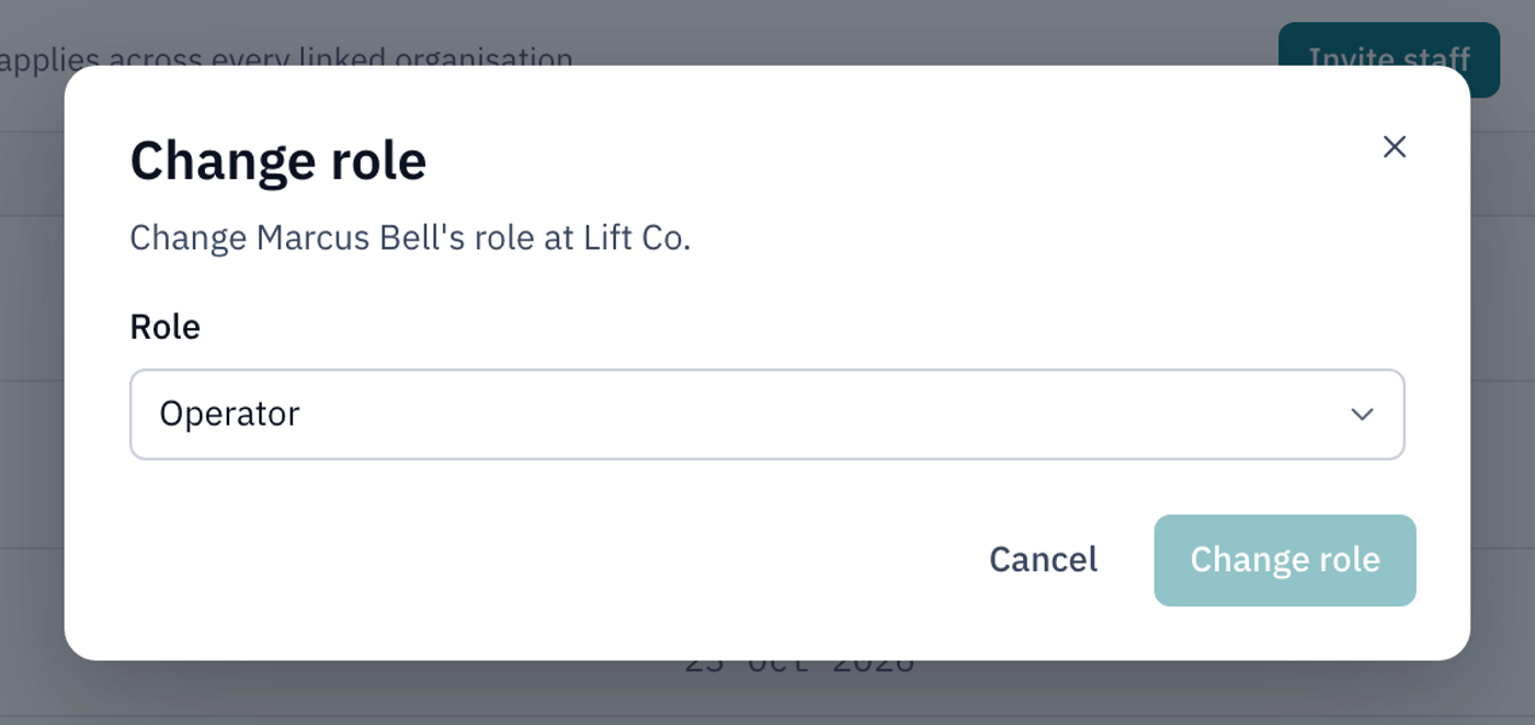 The Change role dialog for Marcus Bell at Lift Co, with the Role list showing Operator