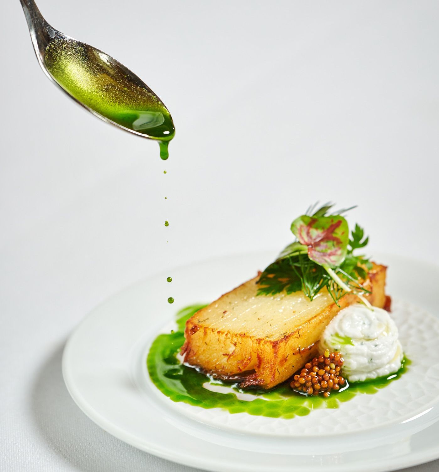 Plate being drizzled