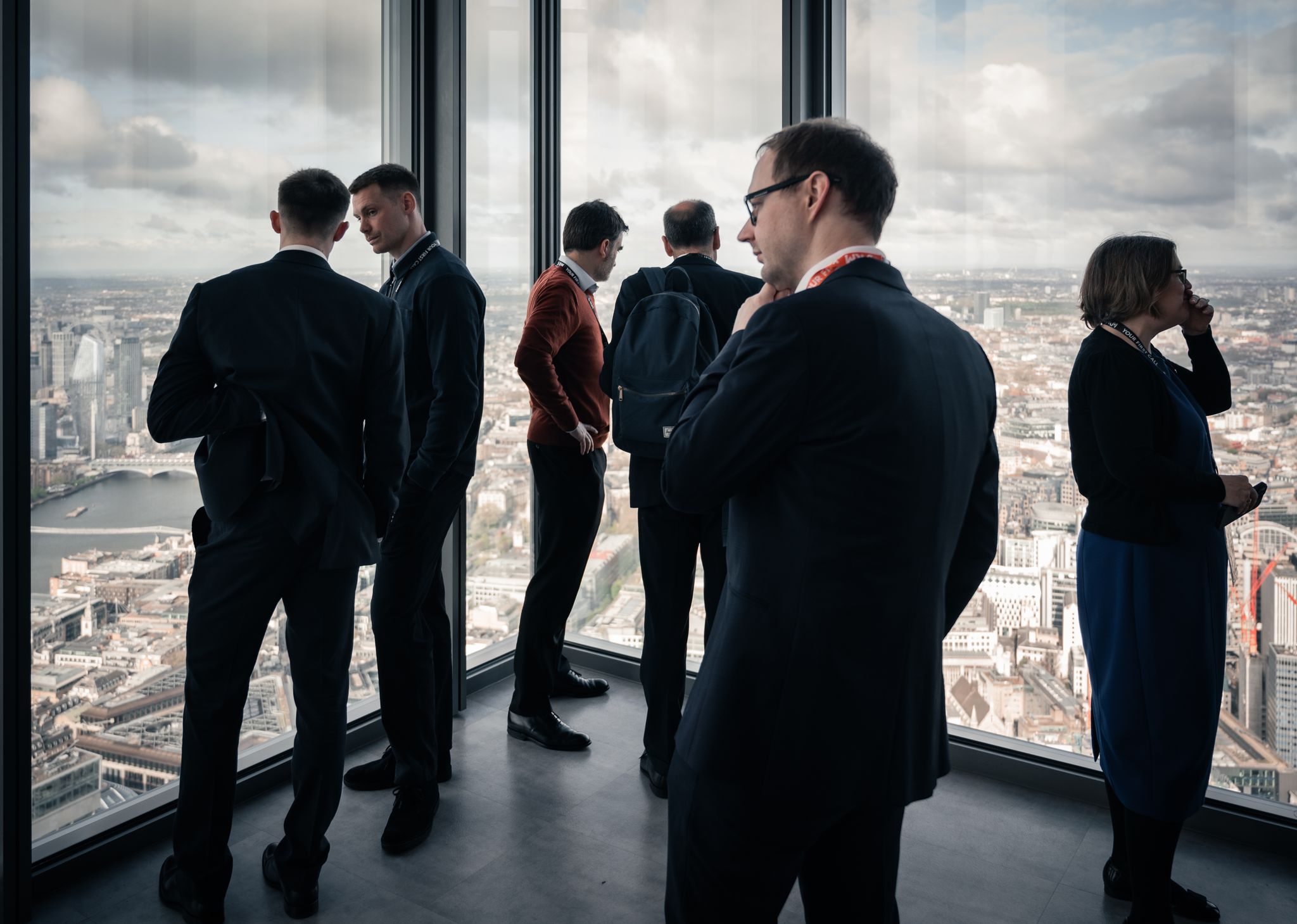 Attendees talking while taking in the views