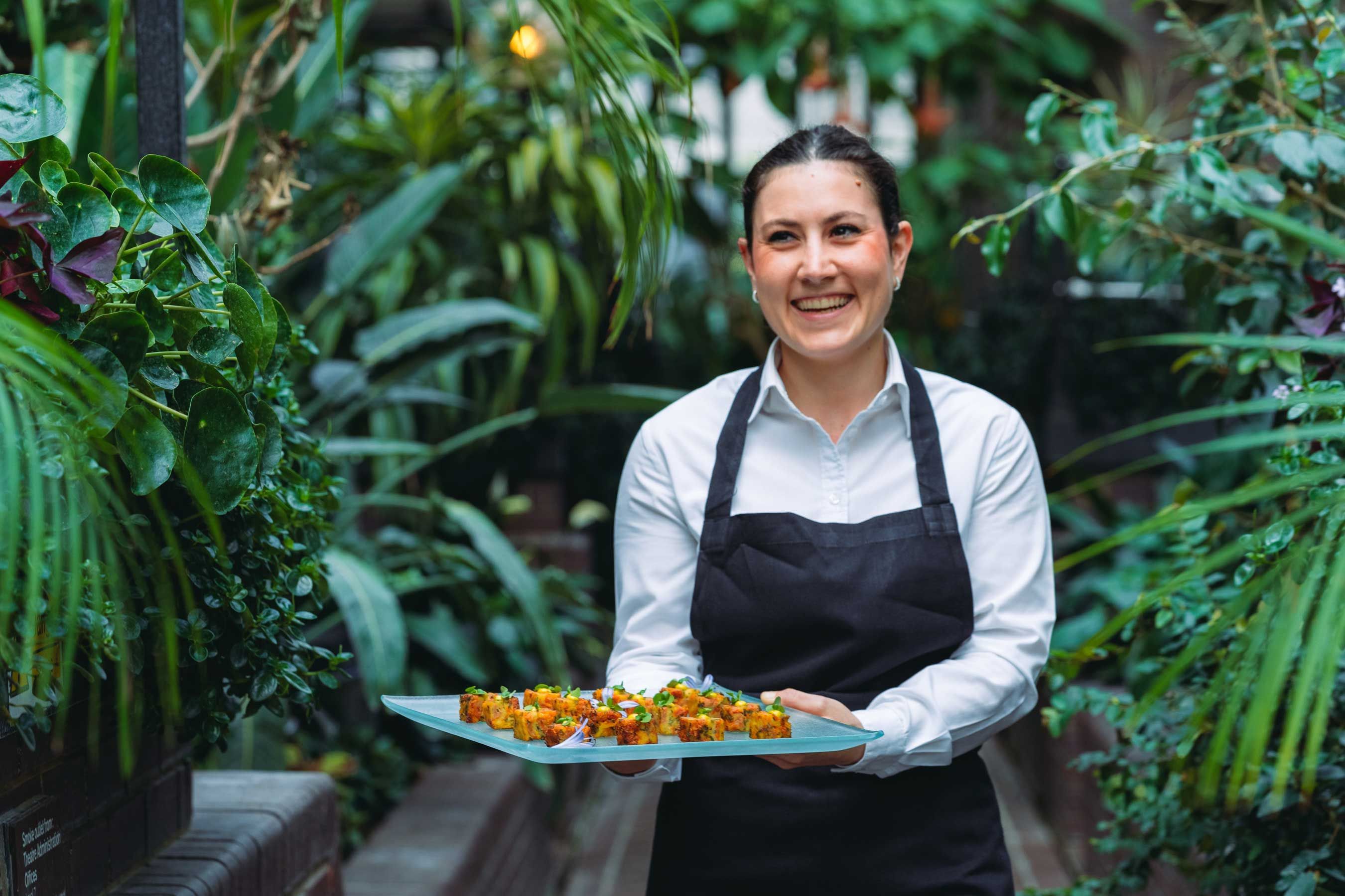 Woman holding platter