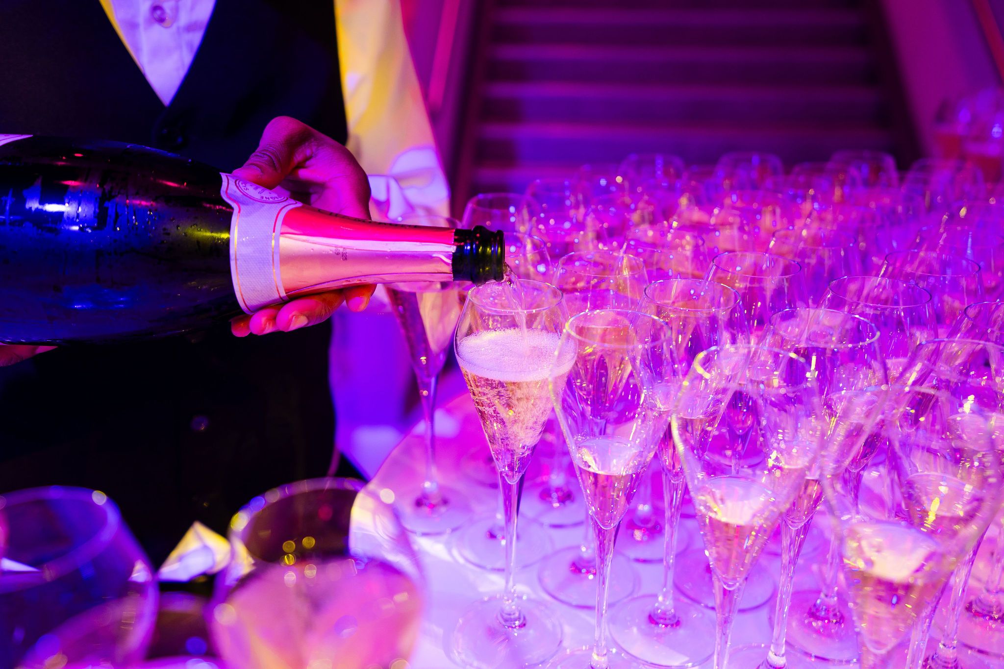 Champagne being poured into glasses
