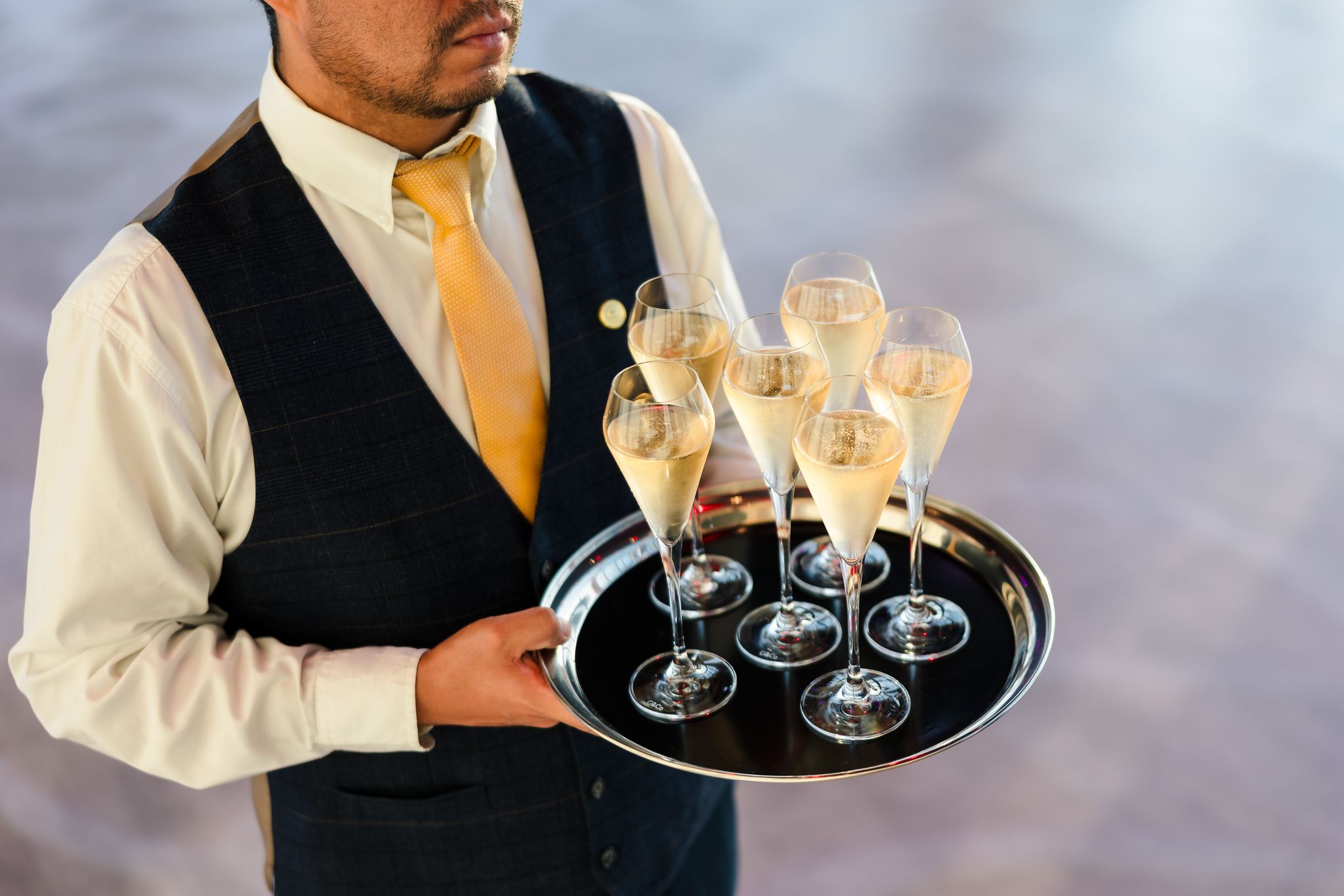 A tray of champagne glasses