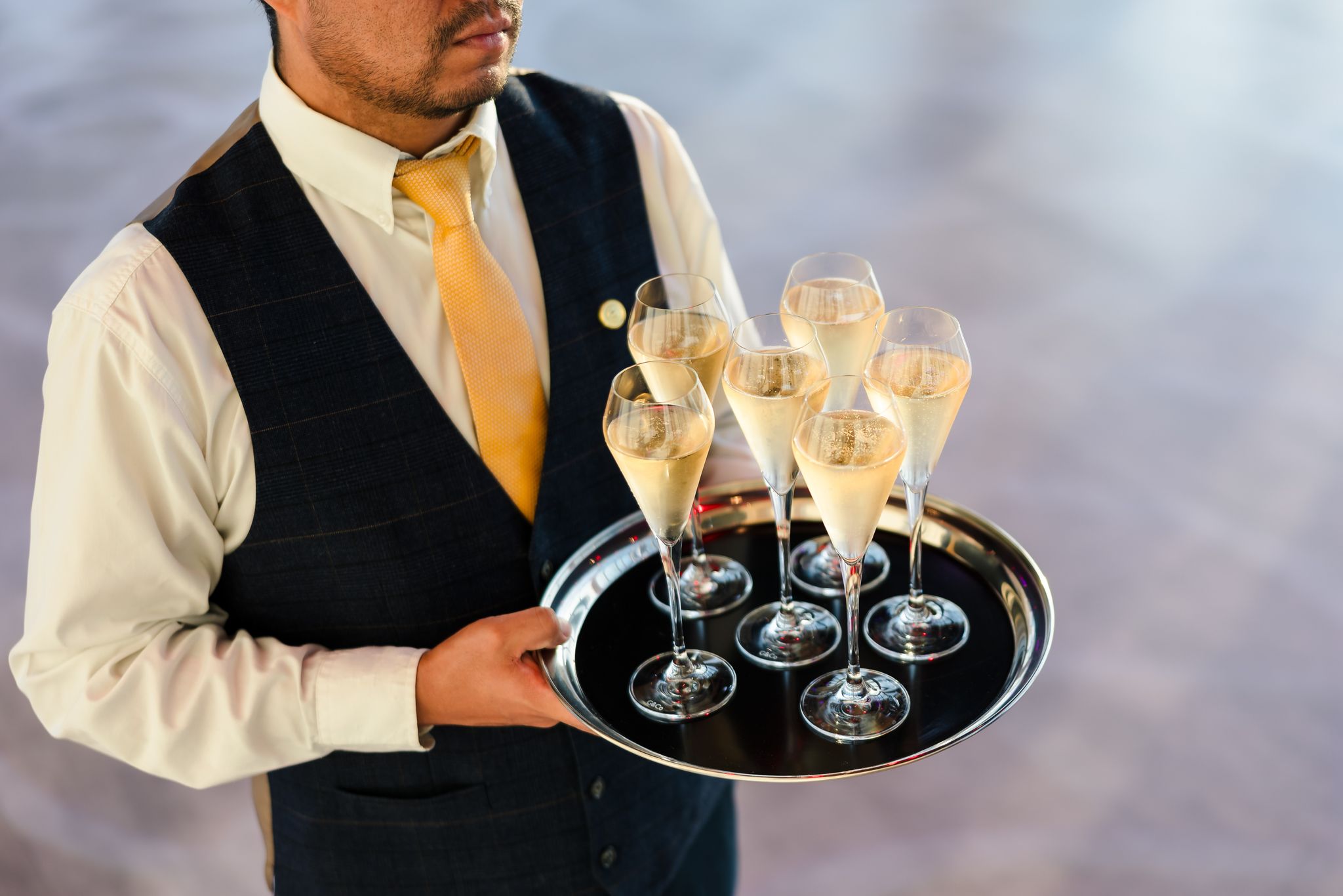 A tray of champagne glasses