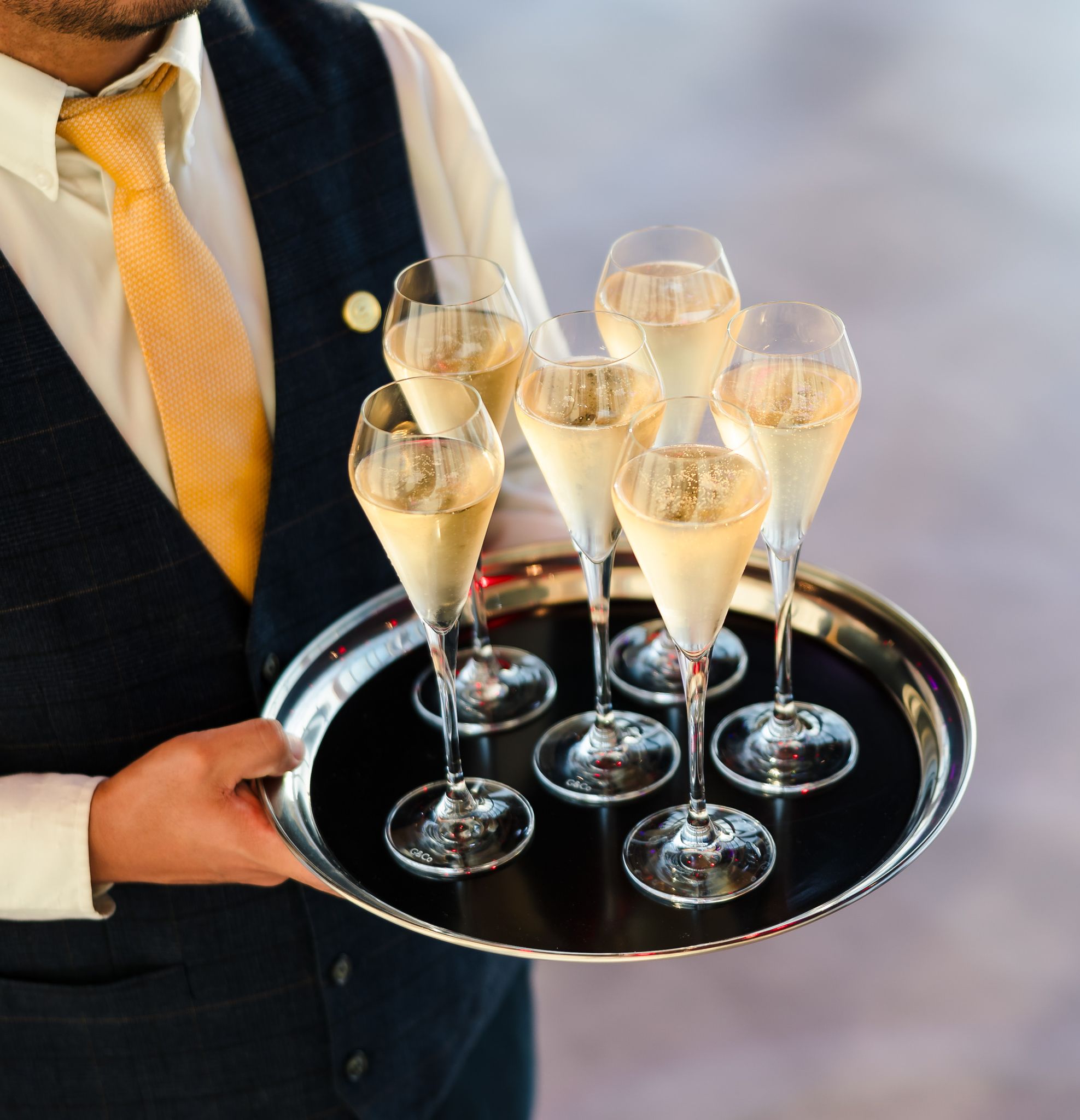 Champagne glasses on tray