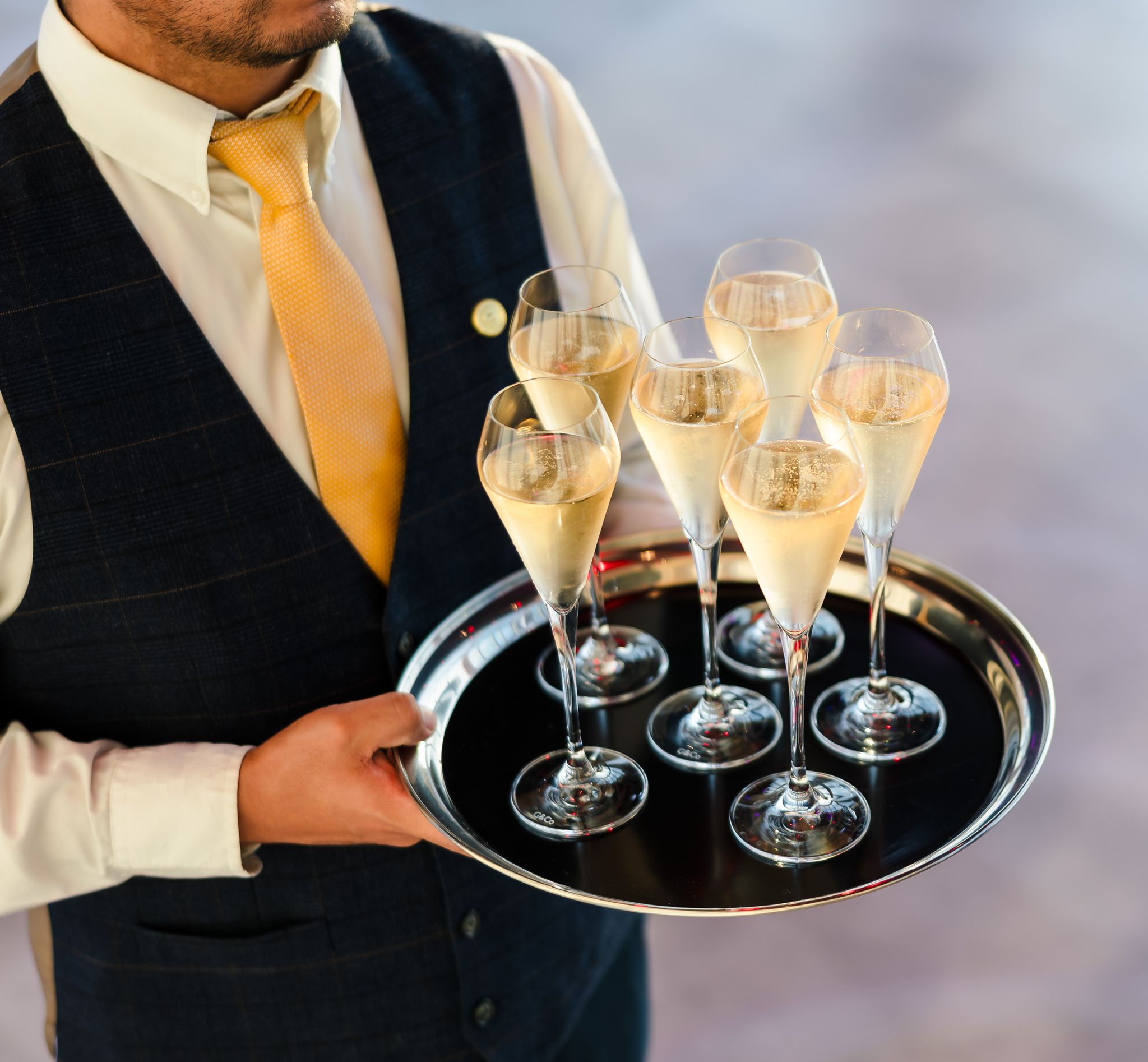 A tray of champagne glasses
