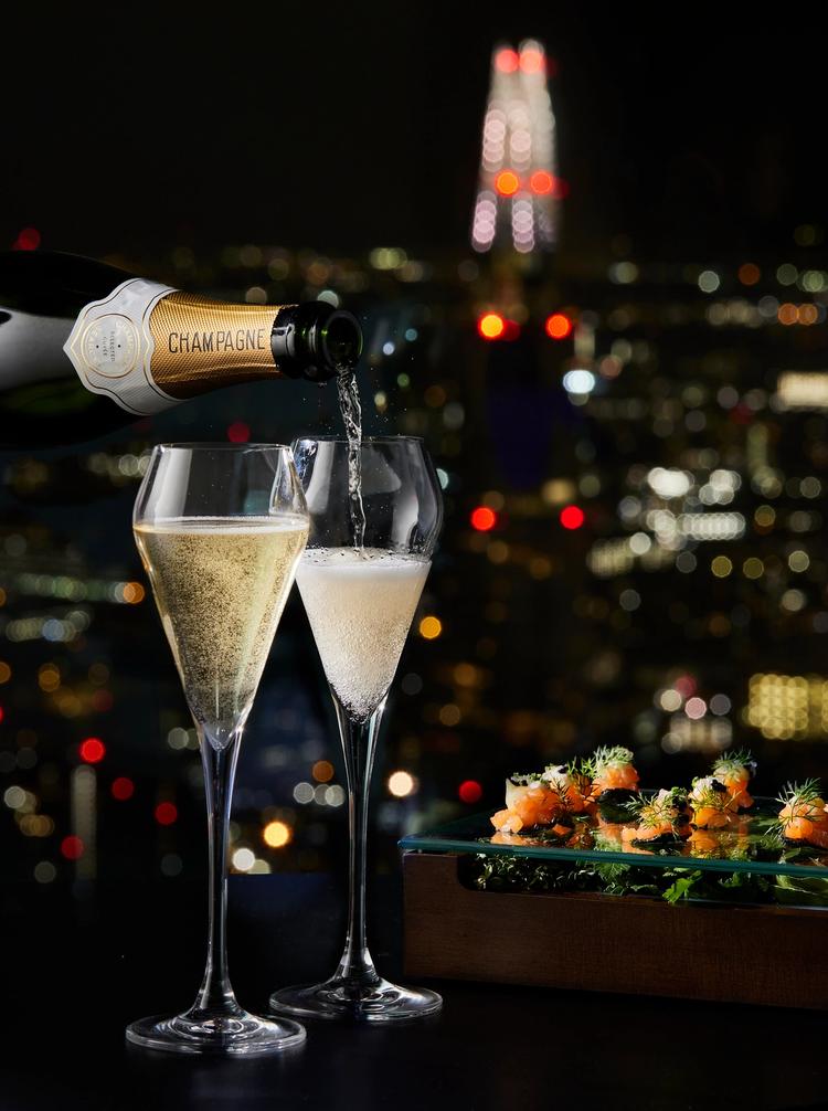 Champagne with London skyline