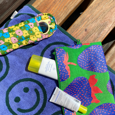 summer pouches with sunscreen and towel :)