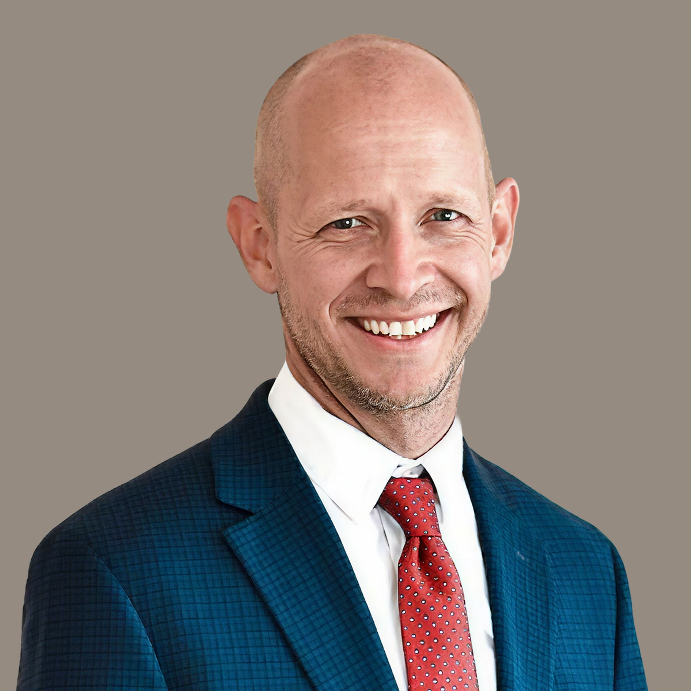 Swenson & Shelley Injury Attorneys — male attorney professional headshot in suit and tie
