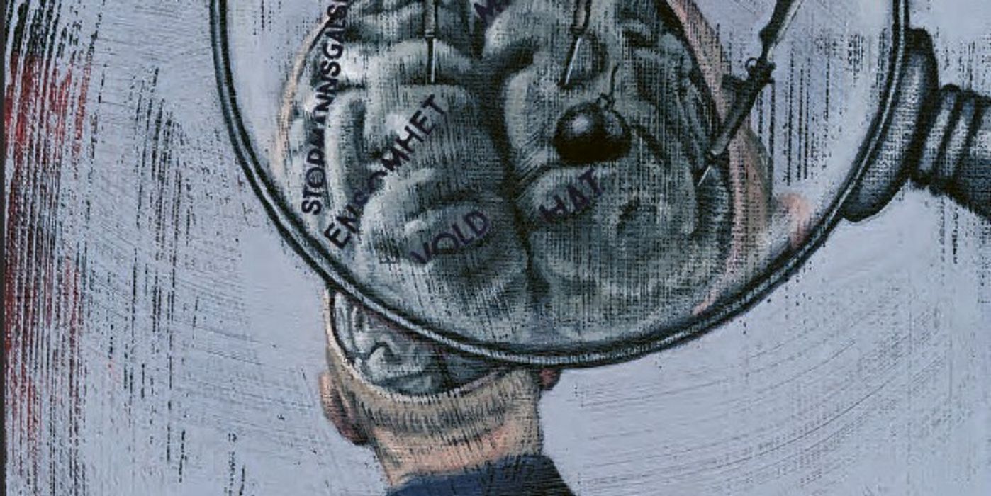 Drawing: Grey-white background. Man in blue shirt. Drawn brain with unreadable words. Magnifying glass that zooms in on brain hemispheres.