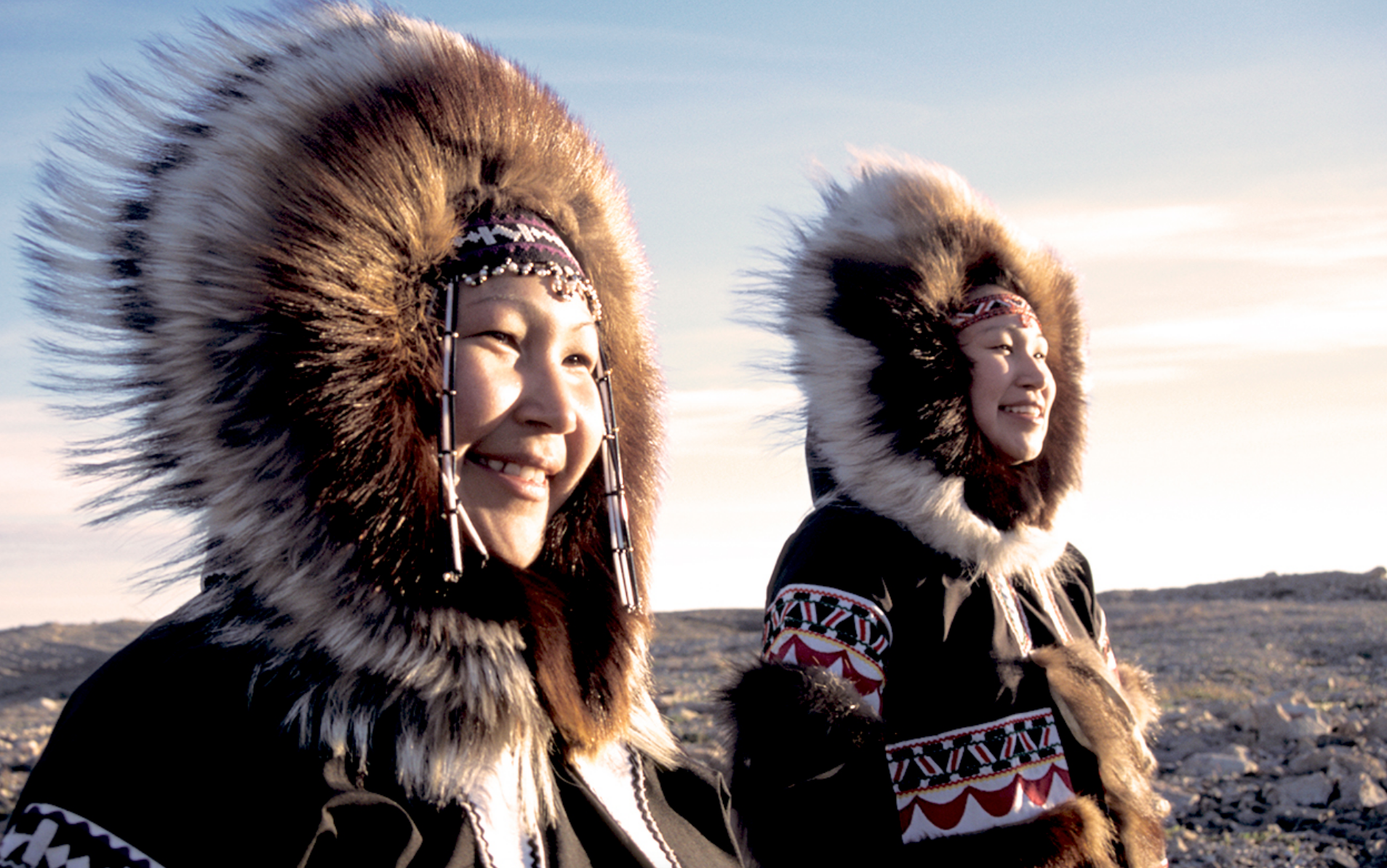 Nunavut citizens gaze across the tundra