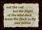 rustic sign with words not the call but the flight of the wild duck leads the flock to fly and follow