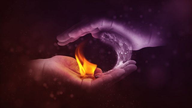 Hands surrounding a flame