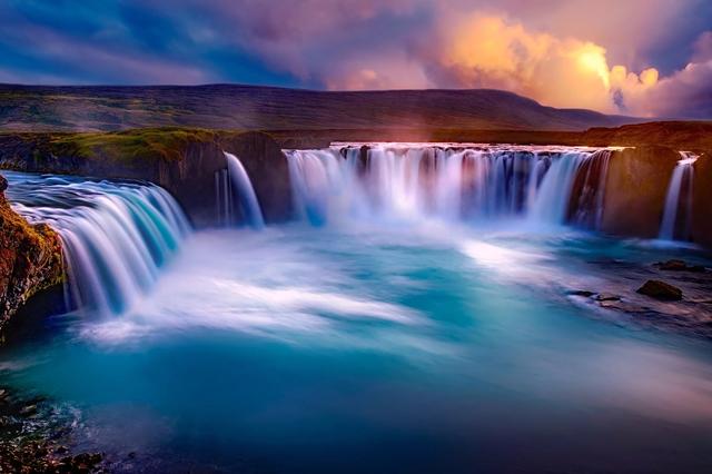rivers and waterfall into large lake