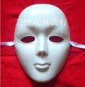 white face mask on red background
