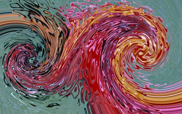 Colorful paint swirling in water