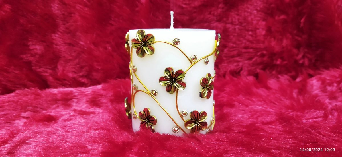 designer candle with color jewelry