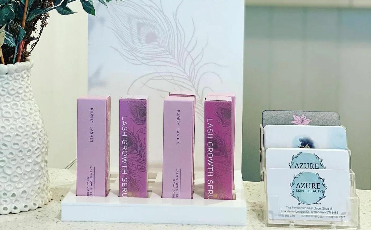 Lash products and appointment cards on the salon counter
