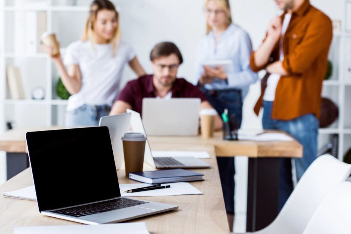 a group people strategizing digital marketing strategies for small businesses