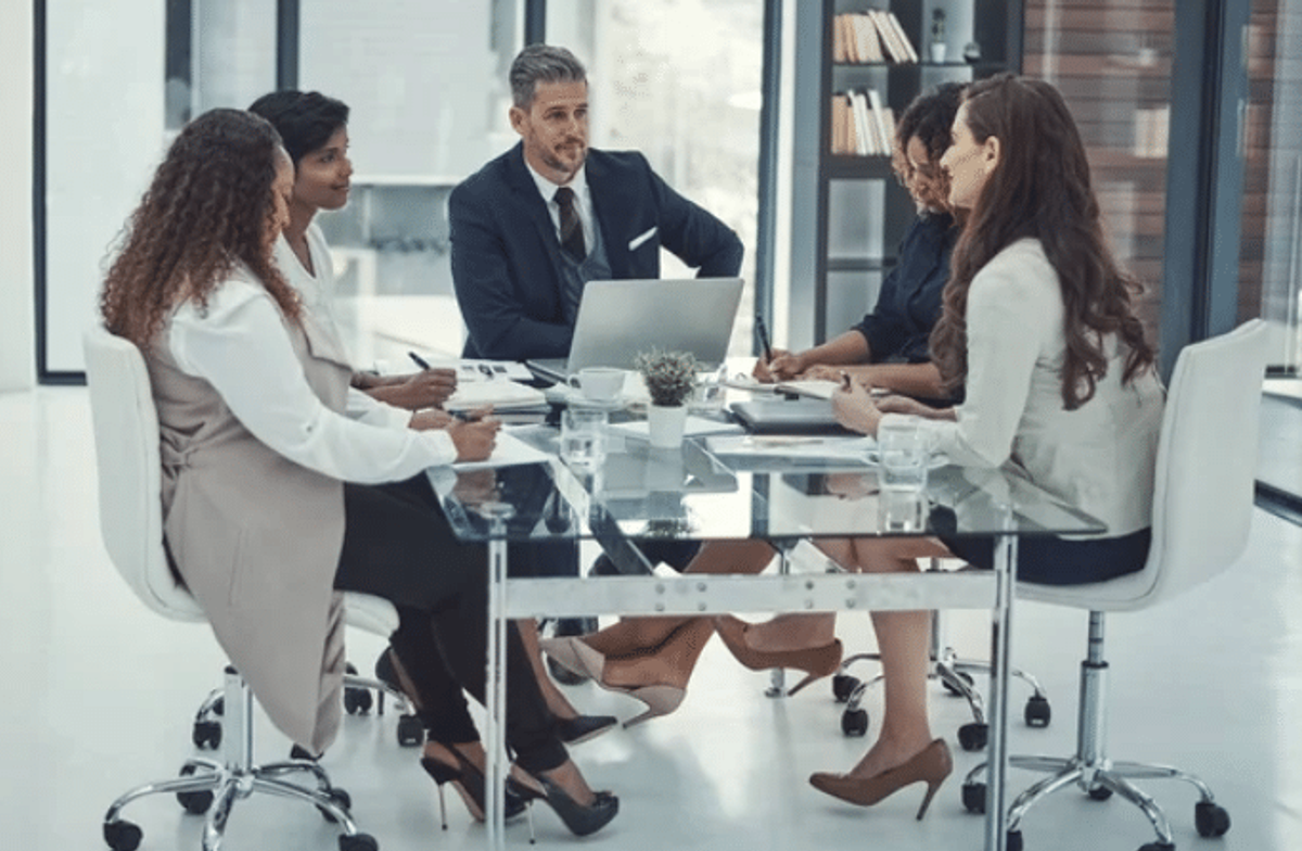 A group of employees having a meeting with their boss. [Branding for Local Business].