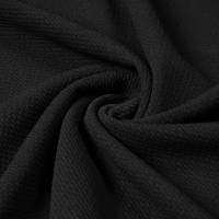 tela-granito-de-arroz-negro-1-telas_real-colombia.webp