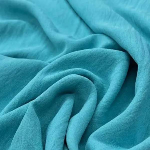 tela-crepe-menta-oscuro-1-telas_real-colombia.webp