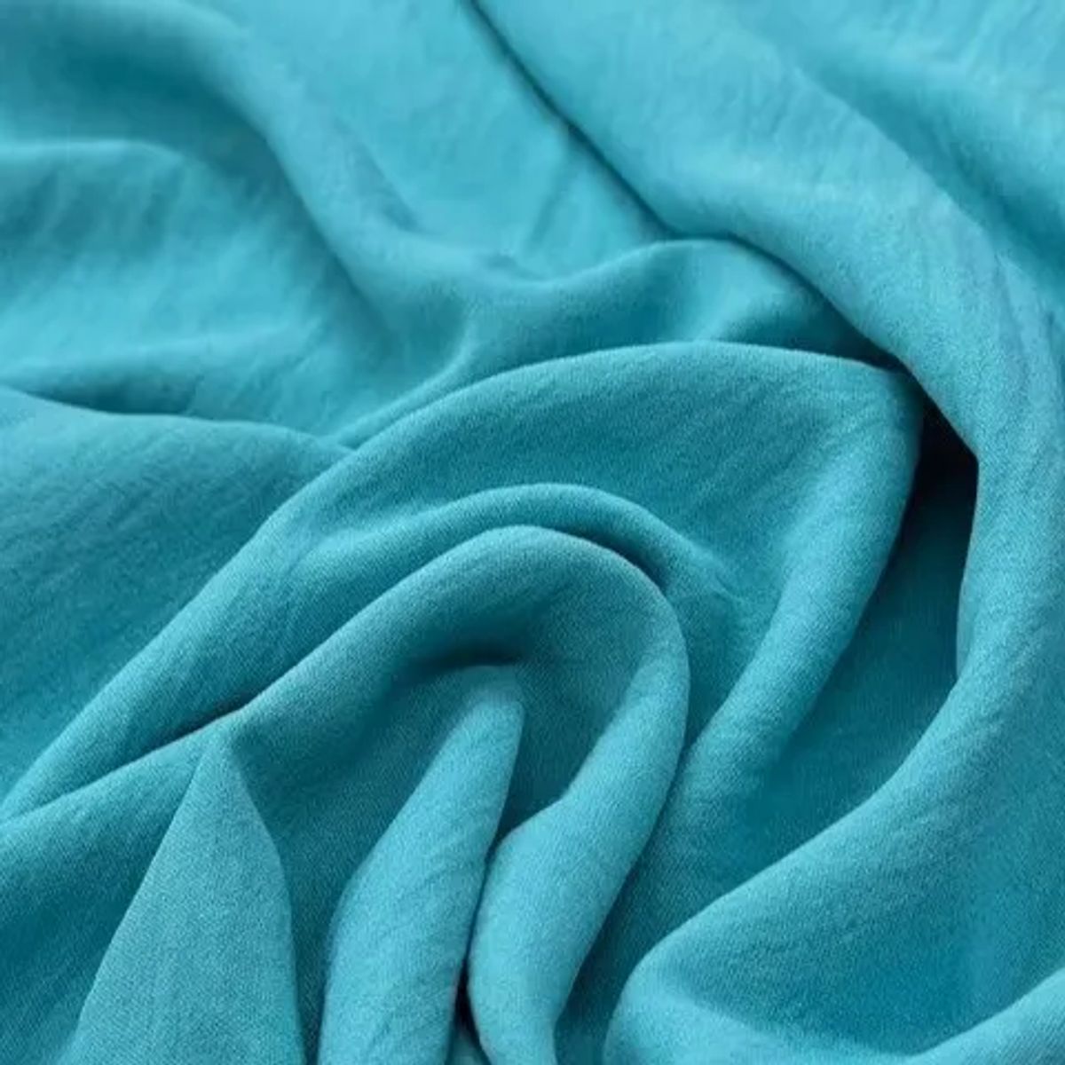 tela-crepe-menta-oscuro-1-telas_real-colombia.webp