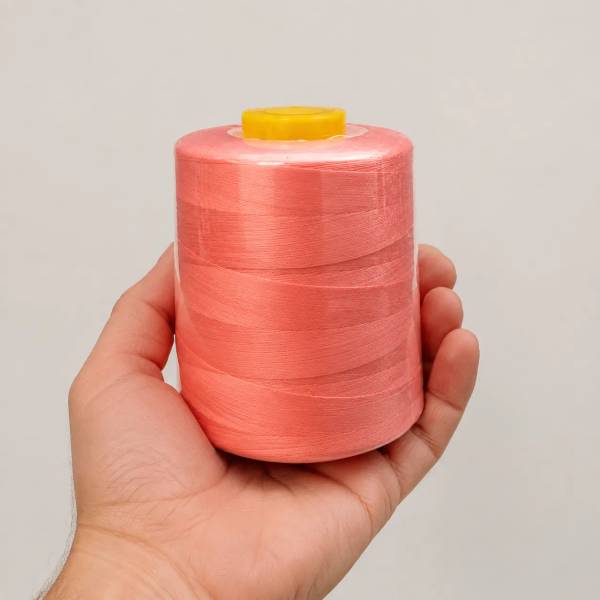 hilo-coser-40-02-rosado-1-telas_real-colombia.webp