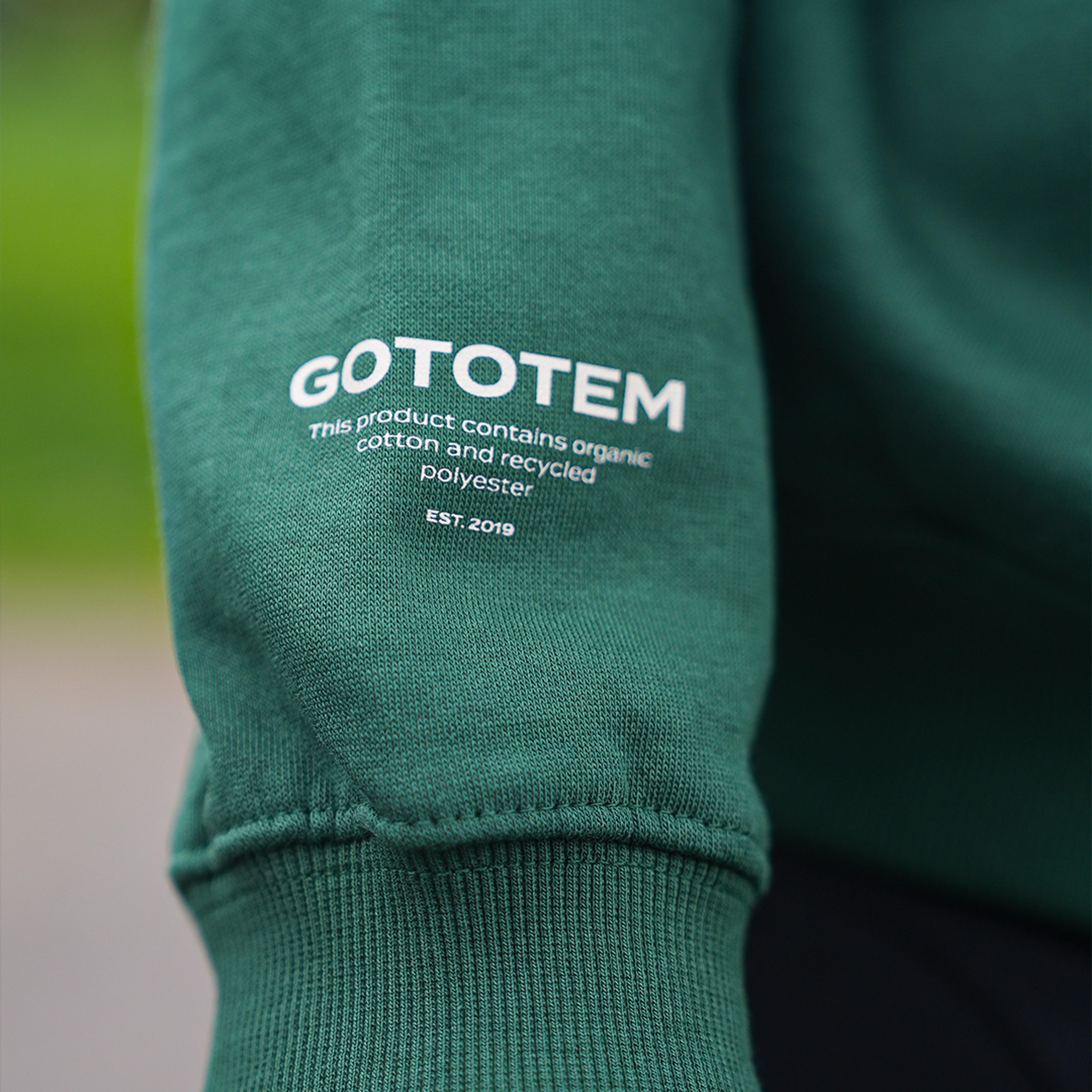 Details of the "Totem Basics" Green Hoodie