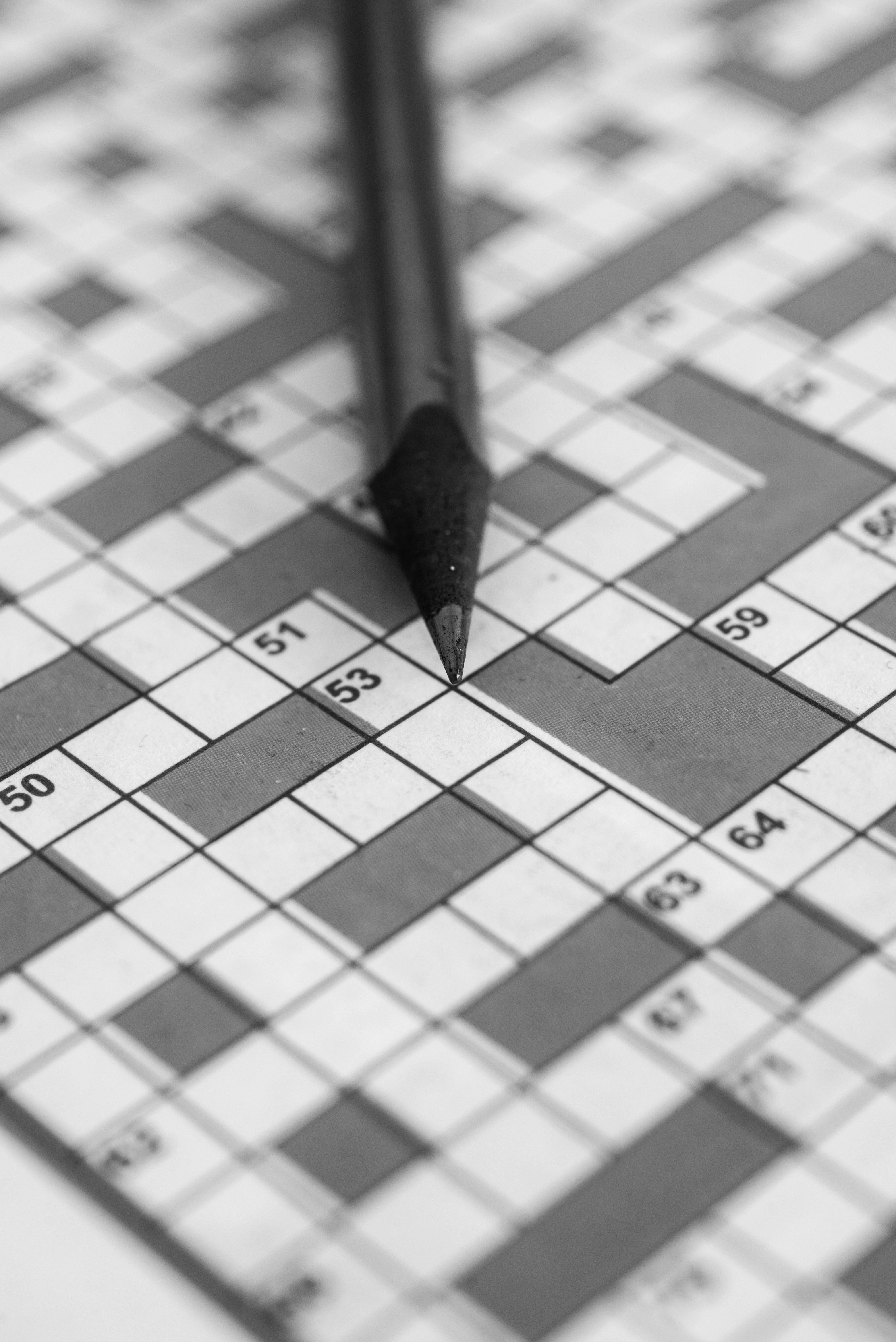 A pencil on a crossword puzzle - Strands answer finder