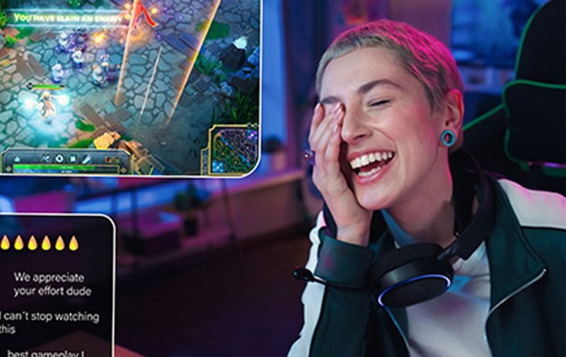 Streamer jouant et interagissant avec son chat en direct sur un moniteur Evnia, démontrant un multitâche fluide et des performances stables.