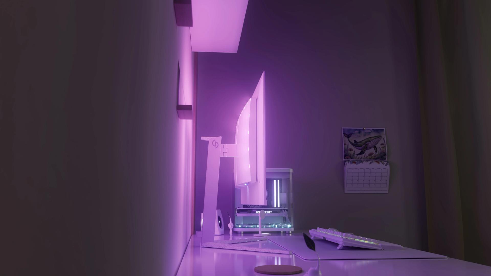 Philips Evnia gamingskärm på skrivbord med lila Ambiglow-belysning och modern PC-setup