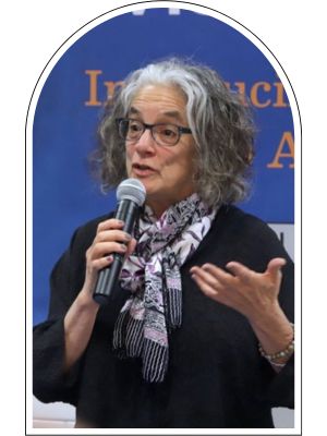 Lainey Feingold holding a microphone