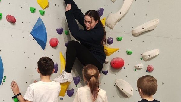 Coach and kids at the RockeeZ bouldering club