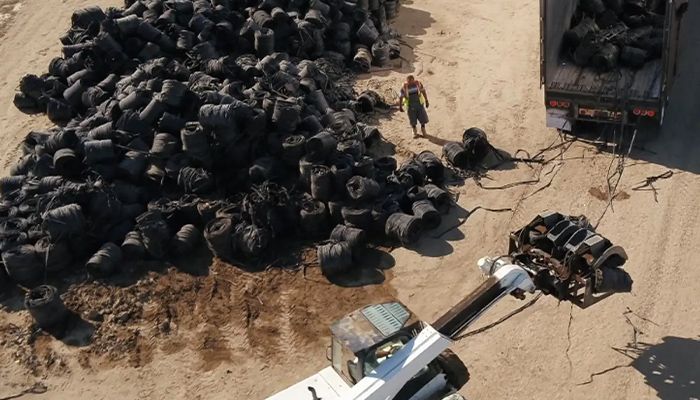 Aerial view of accumulated drip tape with equipment