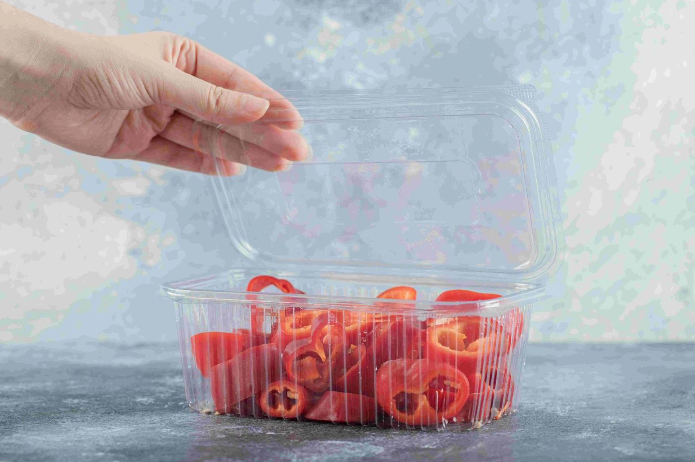 plastic-container-plastic-container-full-with-sliced-red-peppers
