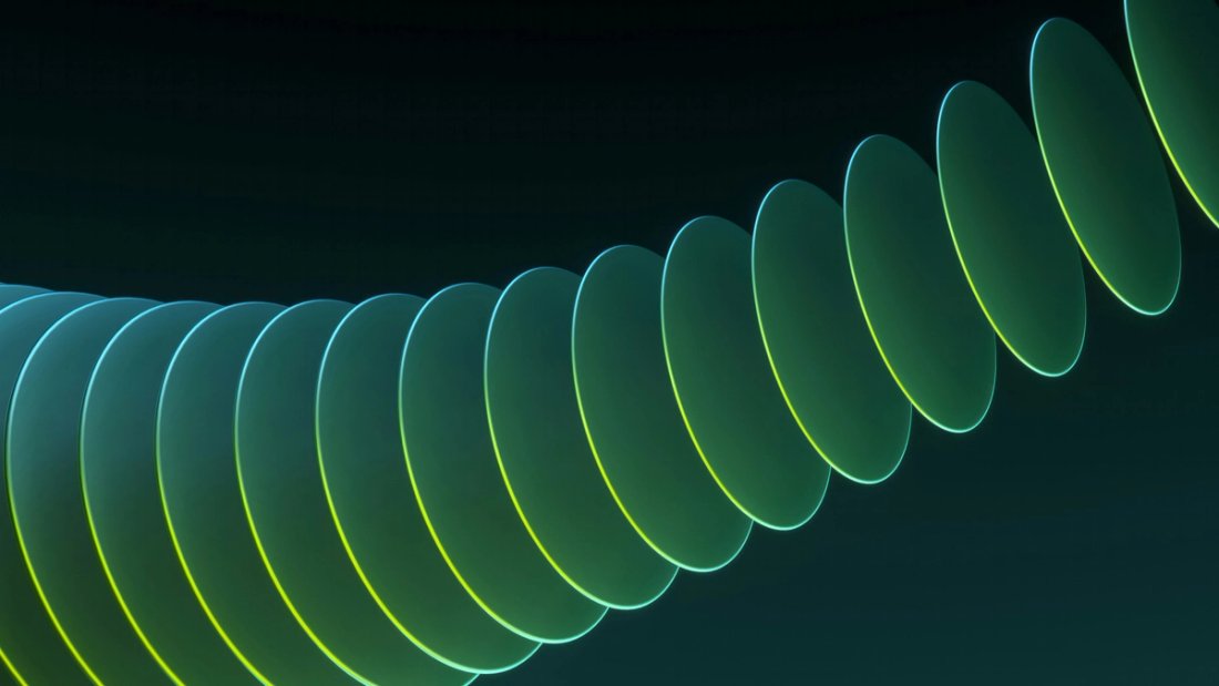Series of green discs trending upward on a black background