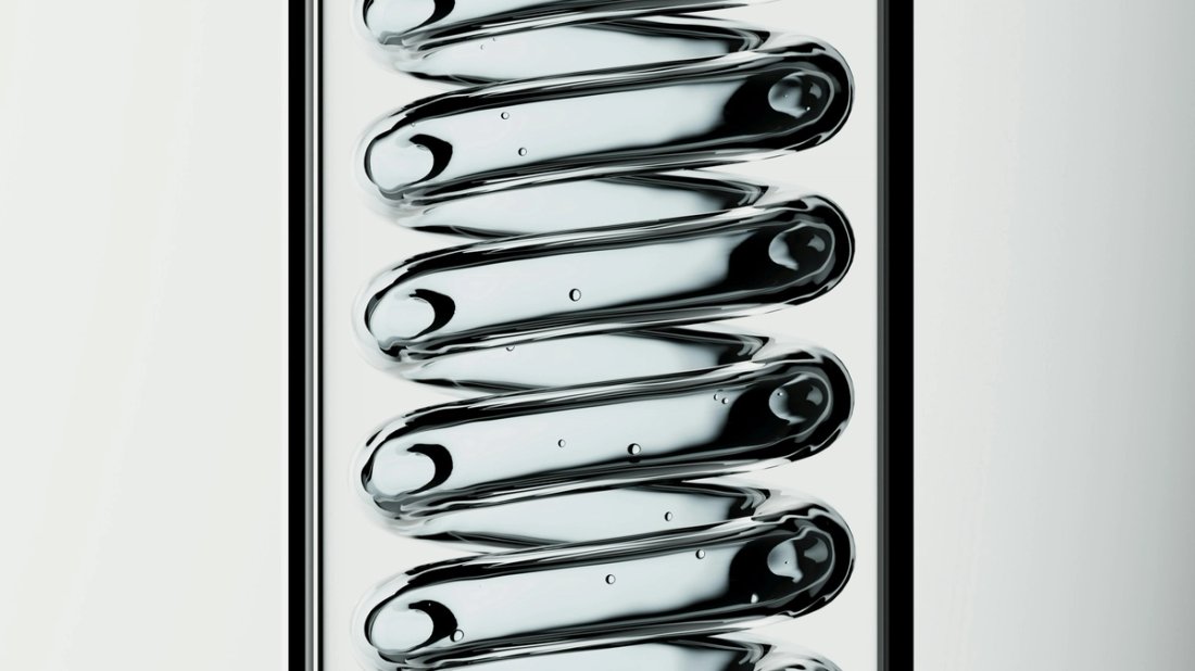 A black-and-white image of a glass coil inside a tube.