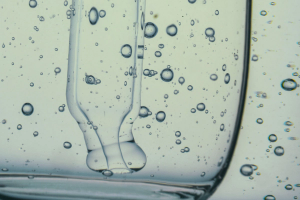 A pipette in clear serum.