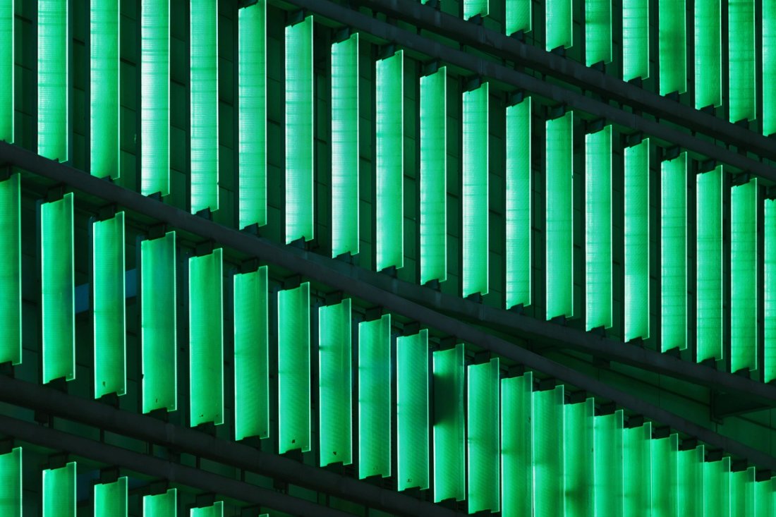 Series of green rectangles on a black background.