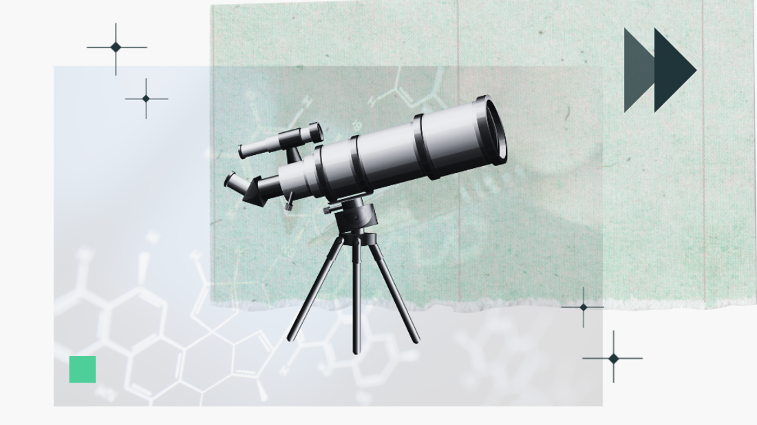 A collage featuring a telescope over science patterned paper.